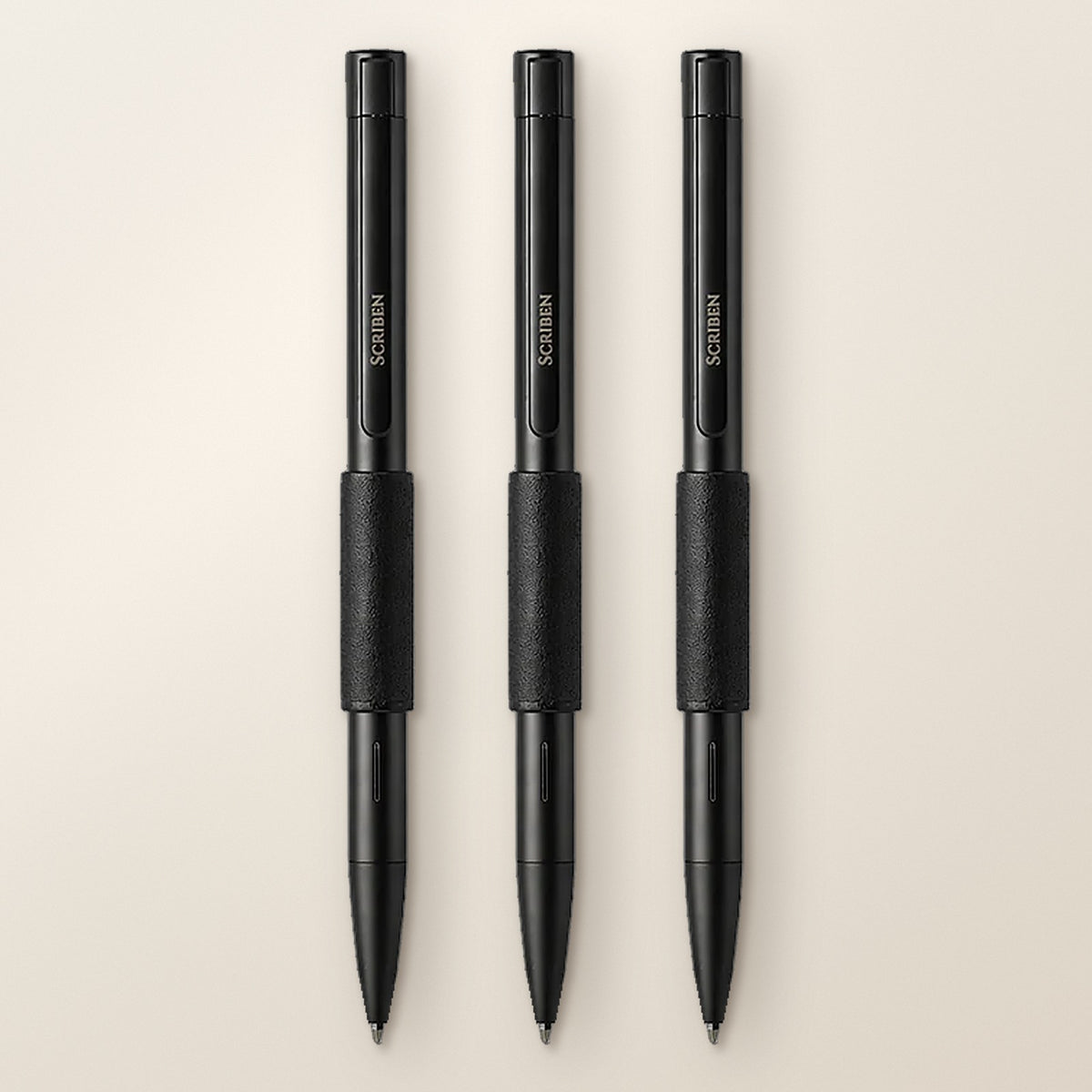 Scriben 3-Pack in Black: three matte black pens with black leather grips